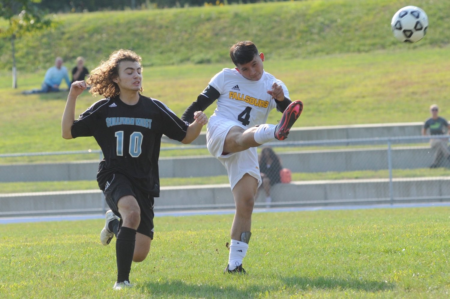 Action, reaction. Sullivan West’s Aoleces Jimenez reacts to a play by the Comets’ Mario Martinez.